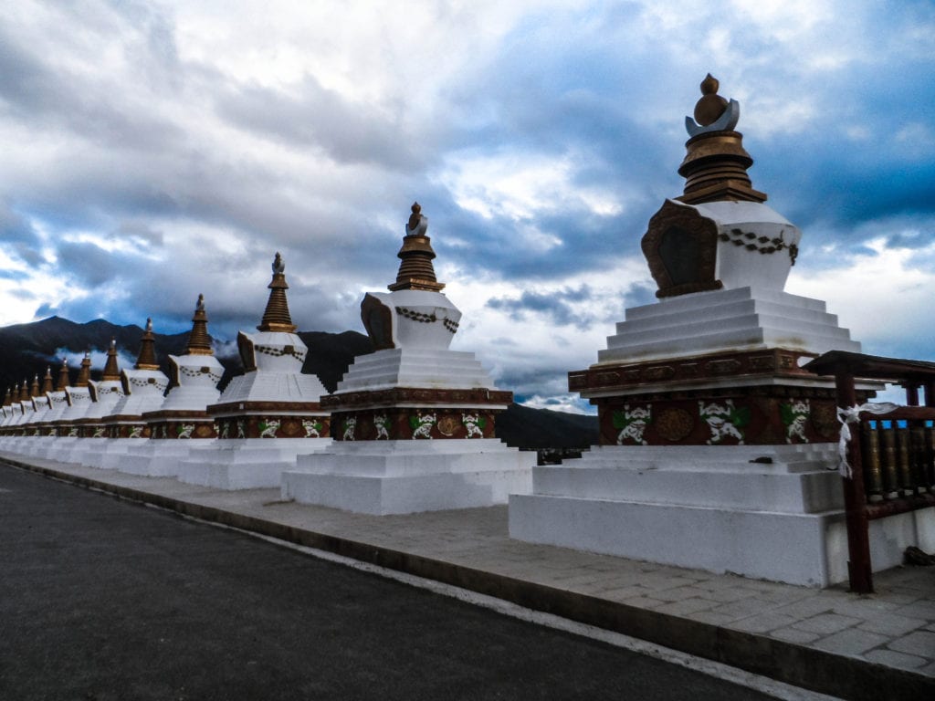 White towers along a mountain road in Yunnan province